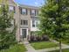 Beautifully maintained brick townhome with front lawn and mature trees at 258 Coatsville Dr, Westfield, IN 46074