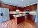 Modern kitchen with stainless steel appliances and center island at 258 Coatsville Dr, Westfield, IN 46074