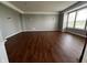 Inviting living room featuring hardwood floors, crown molding, and natural light at 258 Coatsville Dr, Westfield, IN 46074
