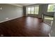 Bright living room with hardwood floors and large windows at 258 Coatsville Dr, Westfield, IN 46074