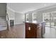 Bright living room with fireplace, hardwood floors, and access to outdoor patio at 258 Coatsville Dr, Westfield, IN 46074