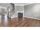 Open-concept living area featuring a fireplace and staircase at 258 Coatsville Dr, Westfield, IN 46074