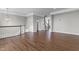 Spacious living room with hardwood floors and staircase, perfect for entertaining at 258 Coatsville Dr, Westfield, IN 46074