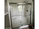 Contemporary shower featuring glass sliding doors, providing both style and functionality at 258 Coatsville Dr, Westfield, IN 46074