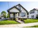Quaint two-story home featuring a covered porch and well-maintained lawn at 270 W Broadway St, Greenwood, IN 46142