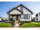 Charming two-story home with a welcoming front porch and landscaped yard at 270 W Broadway St, Greenwood, IN 46142