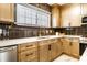Bright kitchen featuring modern fixtures, stainless steel appliances, and abundant countertop space at 270 W Broadway St, Greenwood, IN 46142
