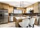 Modern kitchen boasts a stylish island, stainless steel appliances, and sleek cabinets at 270 W Broadway St, Greenwood, IN 46142