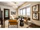Elegant living space with a window seat, modern furnishings, and natural light at 270 W Broadway St, Greenwood, IN 46142