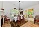 Cozy dining room featuring tile floors, and decorative chandelier above a table with seating for six at 2805 Rylee Ct, Greenwood, IN 46143