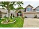 Lovely home featuring a well-manicured lawn and a two-car garage at 2805 Rylee Ct, Greenwood, IN 46143