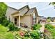 Attractive home with manicured landscaping, brick accents, and a charming front entry at 2805 Rylee Ct, Greenwood, IN 46143