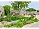Charming two-story home with a beautifully landscaped front yard, mature tree, and inviting curb appeal at 2805 Rylee Ct, Greenwood, IN 46143
