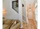 Hallway featuring stairs to the second floor and a view of the front door at 2805 Rylee Ct, Greenwood, IN 46143