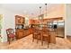 Spacious kitchen with stainless steel appliances, wooden cabinets, and tile flooring at 2805 Rylee Ct, Greenwood, IN 46143