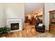 Living room featuring a fireplace and providing open access to the kitchen and other areas of the home at 2805 Rylee Ct, Greenwood, IN 46143