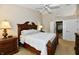 Main bedroom with vaulted ceiling, decorative wood furniture, and an ensuite bathroom with glass enclosed shower at 2805 Rylee Ct, Greenwood, IN 46143