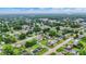 Expansive aerial shot of a residential neighborhood with lush greenery and well-spaced homes at 2832 Hillside Ave, Indianapolis, IN 46218