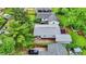 An aerial view of a home's backyard with a well-maintained lawn, and detached garage at 2832 Hillside Ave, Indianapolis, IN 46218