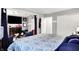 Comfortable bedroom featuring ample space and walk-in closet with stylish decor at 2832 Hillside Ave, Indianapolis, IN 46218