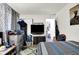 Bedroom showcasing sleeping and office space with natural light and versatile layout at 2832 Hillside Ave, Indianapolis, IN 46218