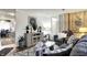 Spacious living room with open layout, stylish decor, and lots of natural light at 2832 Hillside Ave, Indianapolis, IN 46218