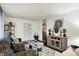 Bright living room with modern decor, featuring a comfortable seating arrangement and stylish accents at 2832 Hillside Ave, Indianapolis, IN 46218