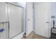 Bathroom with a sliding glass door shower and two doors at 2925 Horse Hill East Dr, Indianapolis, IN 46214
