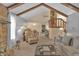 An open-concept living area with stone fireplace and light grey paint at 2925 Horse Hill East Dr, Indianapolis, IN 46214