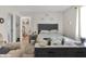 Serene main bedroom with comfortable furnishings, soft lighting, and staircase view at 2925 Horse Hill East Dr, Indianapolis, IN 46214