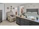 Spacious main bedroom featuring soft carpeting, a recliner and plenty of decor at 2925 Horse Hill East Dr, Indianapolis, IN 46214