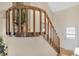 A landing features a wooden railing with decorative plant at 2925 Horse Hill East Dr, Indianapolis, IN 46214