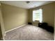 Neutral bedroom with carpet, a window with curtains, and ample closet space at 3065 Hemlock Way, Indianapolis, IN 46203