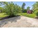 Spacious backyard with a concrete patio and a storage shed at 311 Thornberry Dr, Carmel, IN 46032