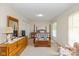 Comfortable bedroom with natural light, carpet, and space for relaxation at 311 Thornberry Dr, Carmel, IN 46032