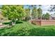 Well-manicured lawn leading to a deck, perfect for outdoor relaxation and entertaining at 318 Meadowview Ln, Greenwood, IN 46142