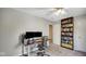This bedroom has a large desk, built in shelves, and neutral colored walls at 318 Meadowview Ln, Greenwood, IN 46142