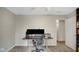 A bright bedroom with a desk and chair, and natural light at 318 Meadowview Ln, Greenwood, IN 46142