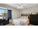 This bedroom features a stylish hammock chair, modern decor and lots of natural light at 318 Meadowview Ln, Greenwood, IN 46142
