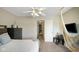 This Bedroom has stylish decor, a mounted tv and a unique hammock chair at 318 Meadowview Ln, Greenwood, IN 46142