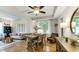 Dining area showcasing a large table, stylish decor, and seamless flow to other rooms at 318 Meadowview Ln, Greenwood, IN 46142