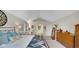 Bright main bedroom features vaulted ceilings and connects to an en suite bath at 318 Meadowview Ln, Greenwood, IN 46142