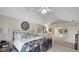 Bright main bedroom features vaulted ceilings and a decorative metal bed frame at 318 Meadowview Ln, Greenwood, IN 46142