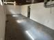 Unfinished basement providing a blank canvas for customization, with exposed ceiling and concrete floors at 330 S Butler Ave, Indianapolis, IN 46219