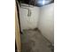 Unfinished basement with concrete walls and floor at 330 S Butler Ave, Indianapolis, IN 46219
