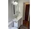 Bathroom featuring modern vanity, chrome fixtures and new mirror and light fixtures at 330 S Butler Ave, Indianapolis, IN 46219