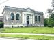 Exterior shot of library featuring beautiful architecture and landscaping at 330 S Butler Ave, Indianapolis, IN 46219