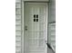 Close-up of a white front door at 330 S Butler Ave, Indianapolis, IN 46219