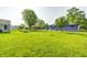 A wide open backyard with mature trees at 3414 Ferncliff Ave, Indianapolis, IN 46227