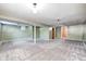 View of the unfinished basement showing the neutral carpeting and painted walls at 3414 Ferncliff Ave, Indianapolis, IN 46227